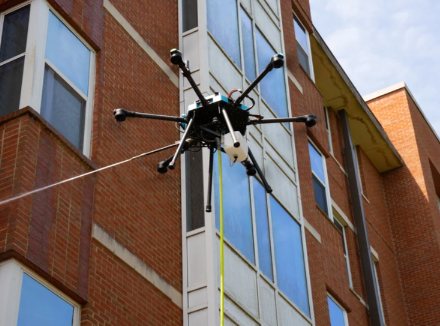 Drone cleaning a university dorm building